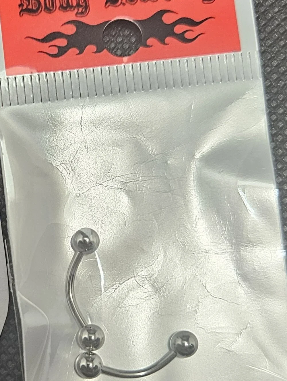 N/A curved eyebrow
